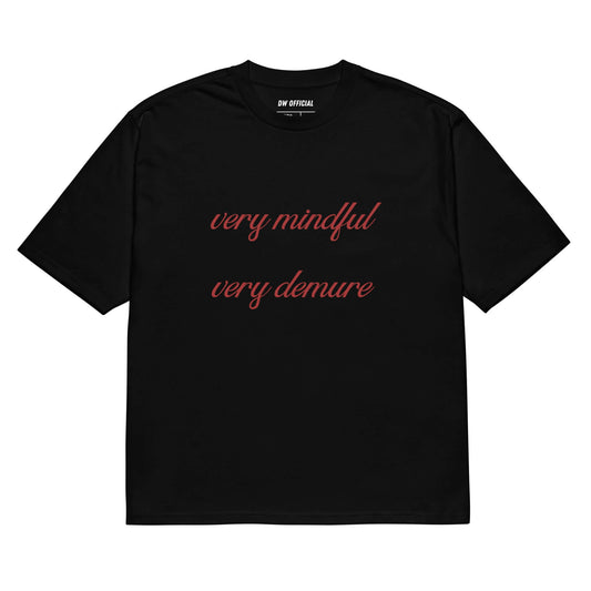 Black oversized t-shirt with the red slogan "Very Mindful Very Demure" printed on the front, unisex design.