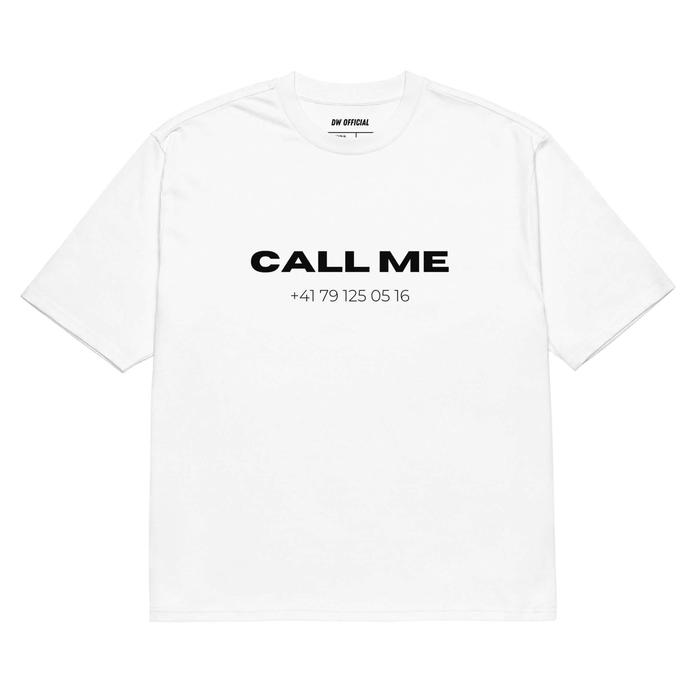 White oversized t-shirt with the slogan "Call Me" and a random swiss phone number printed on the front, unisex design.