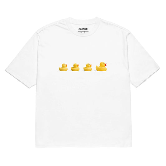 White oversized t-shirt with the print of yellow ducks on the front, unisex design.