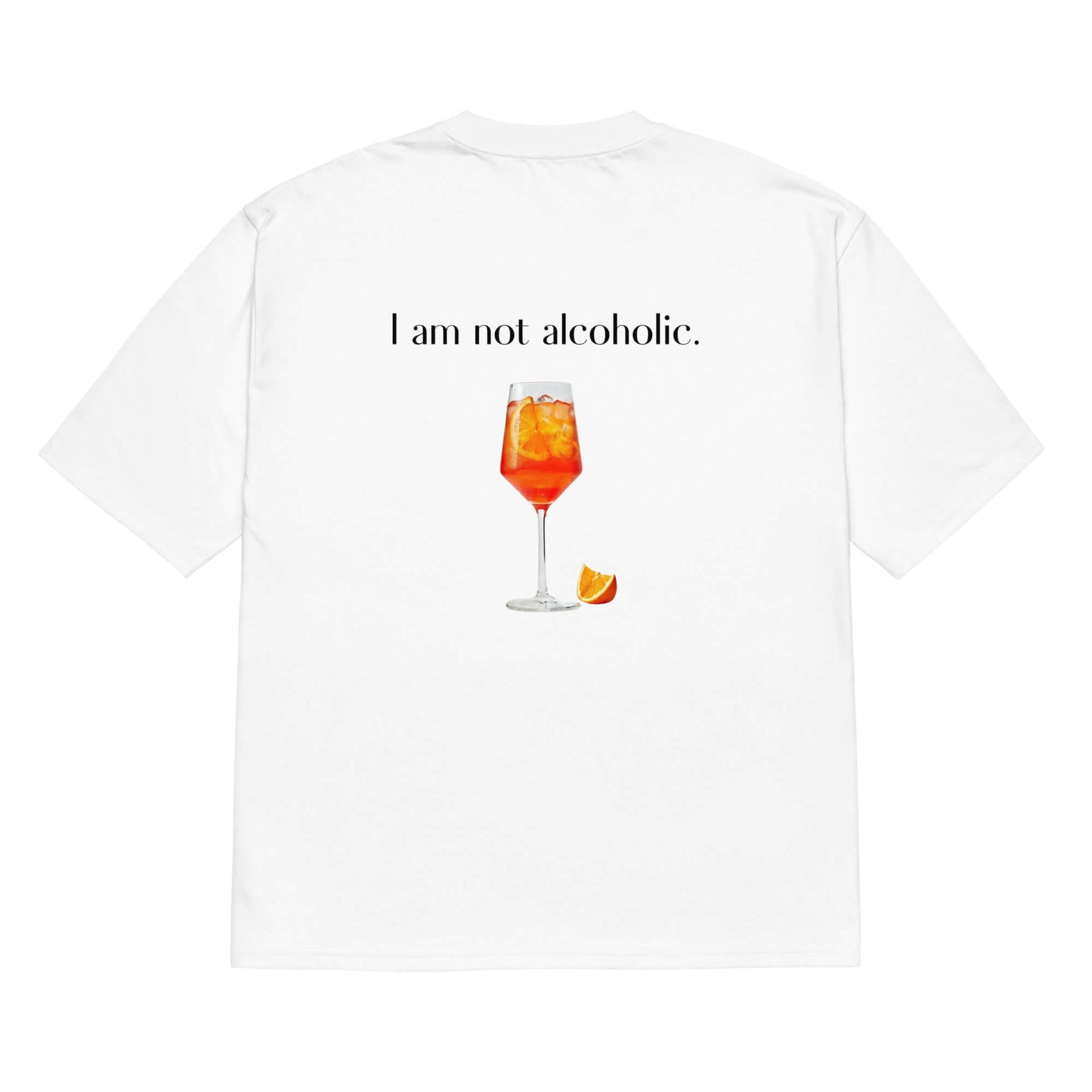 White oversized t-shirt with the slogan "I am not Alcoholic" and an Aperol Spritz glass printed on the back, and "I am." printed on the front, top right, unisex design.