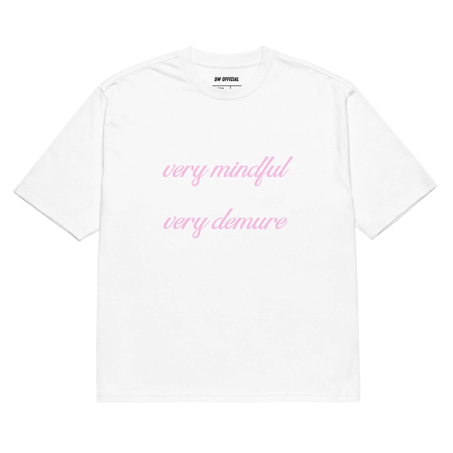 White oversized t-shirt with the pink slogan "Very Mindful Very demure" printed on the front, unisex design.