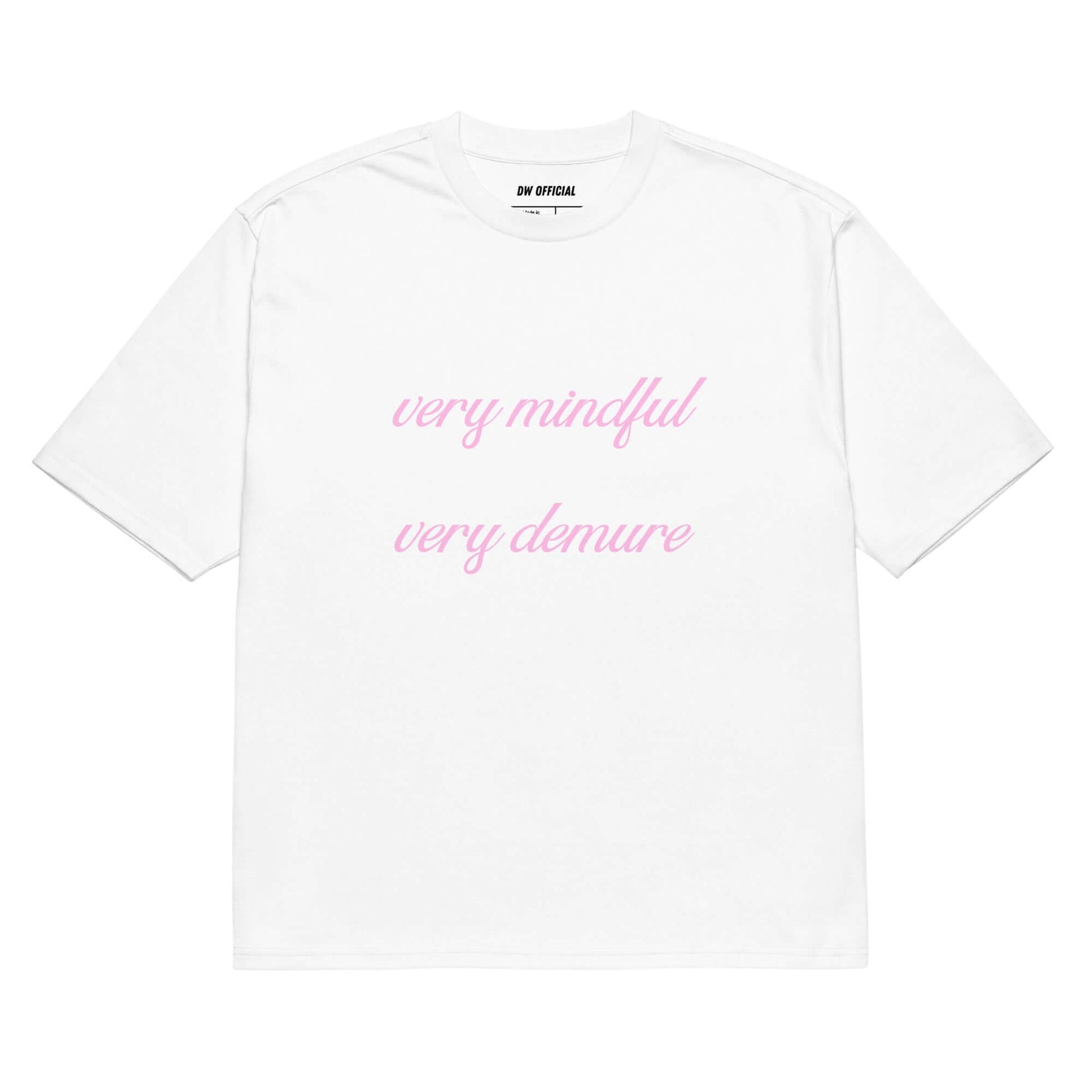 White oversized t-shirt with the pink slogan "Very Mindful Very demure" printed on the front, unisex design.